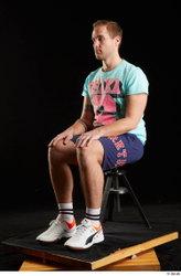 Whole Body Man White Sports Shoes Shirt T shirt Shorts Average Sitting Studio photo references